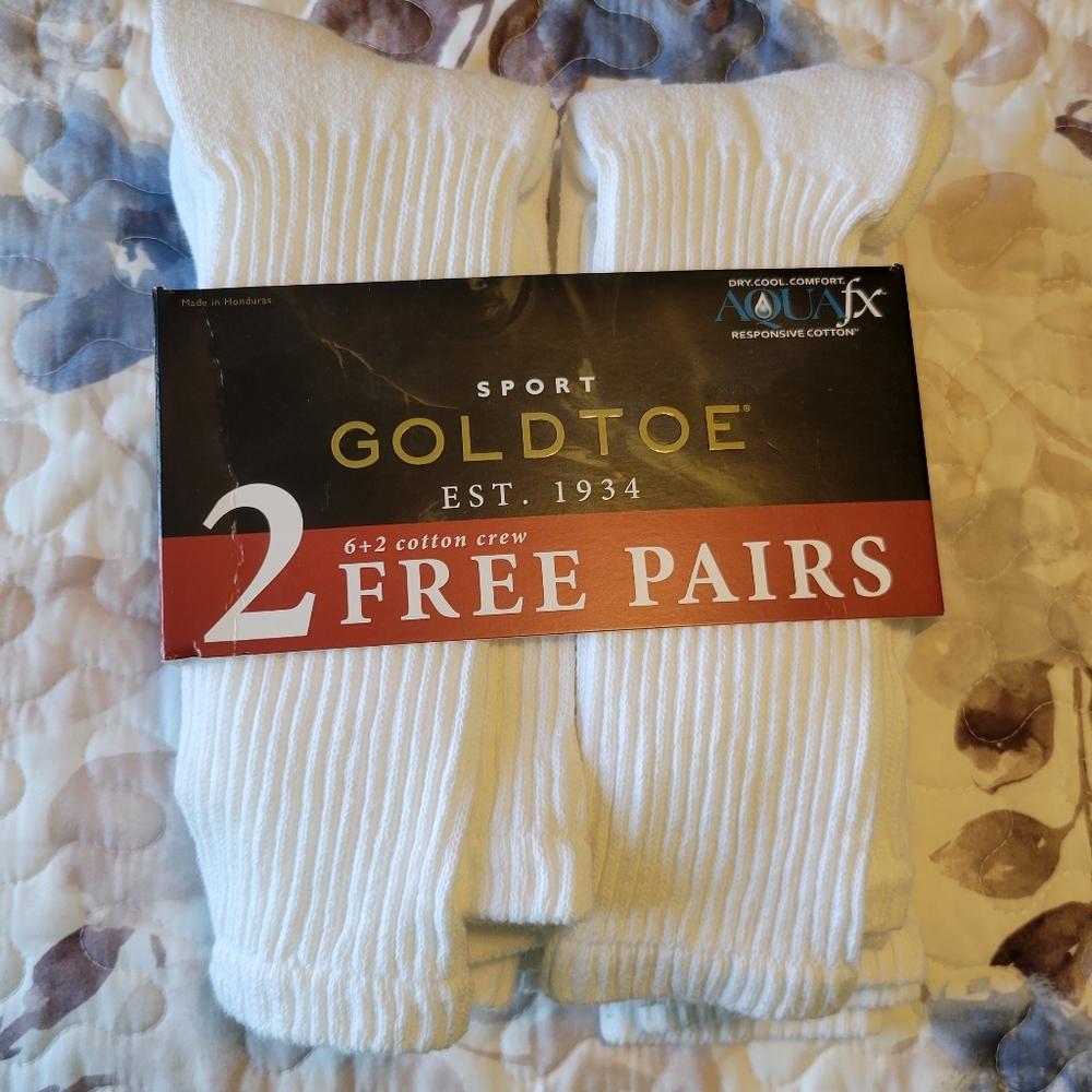 GoldToe men's white tall socks.